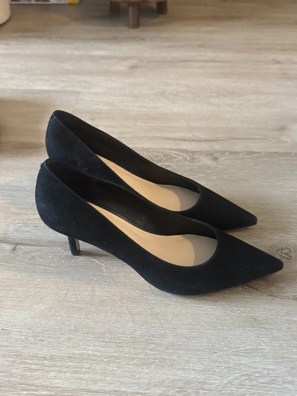 Black suede pumps